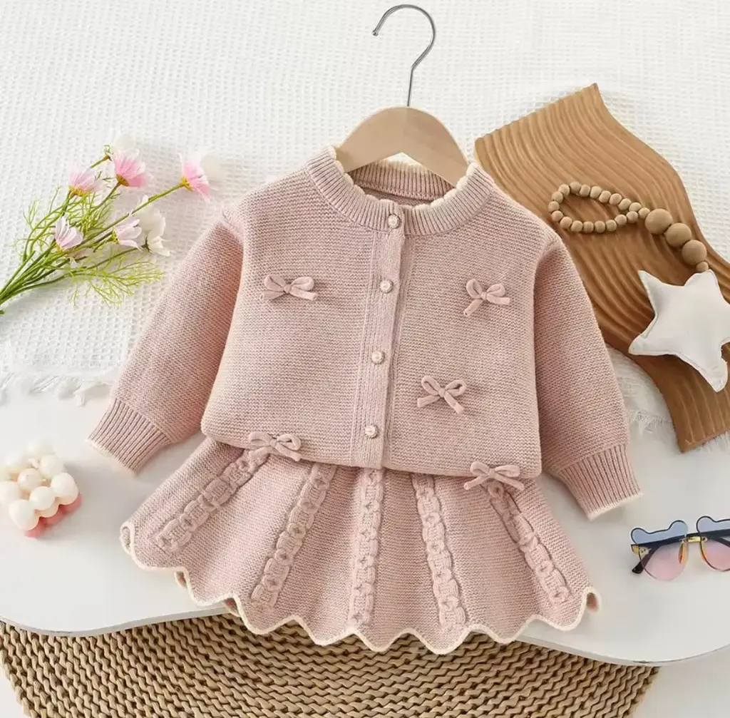 طقم شتوي بلوزة مع تنورة زهري 